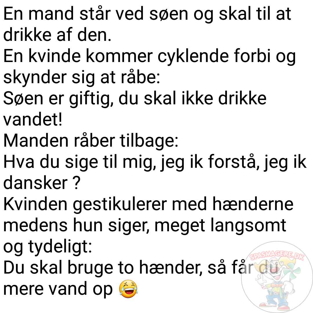 en mand står ved søen